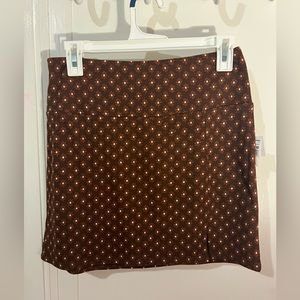 “Ultra Flirt” brown flowery mini skirt. 70’s vibes